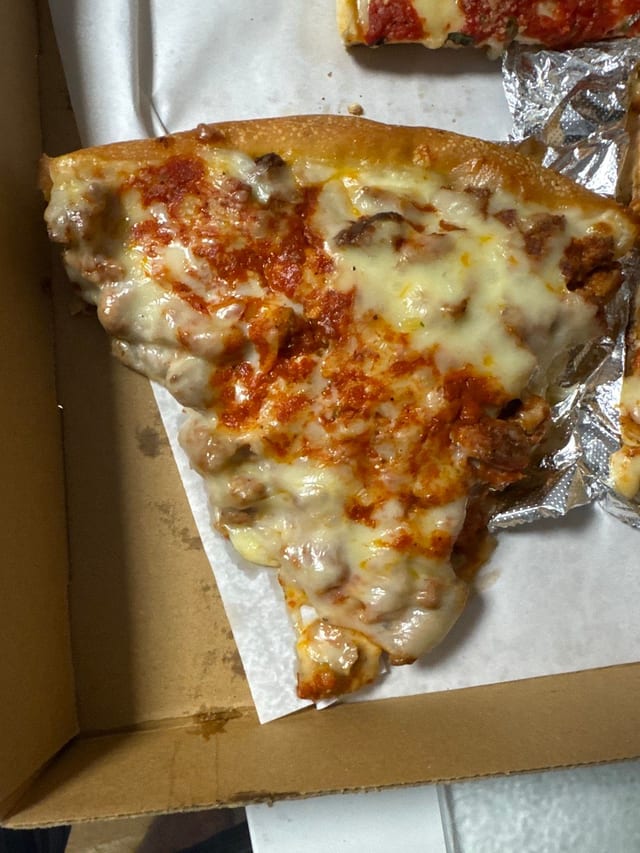 Eggplant Parm Pizza Slice.